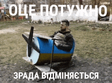 a man is sitting in a chair made out of a barrel with a propeller