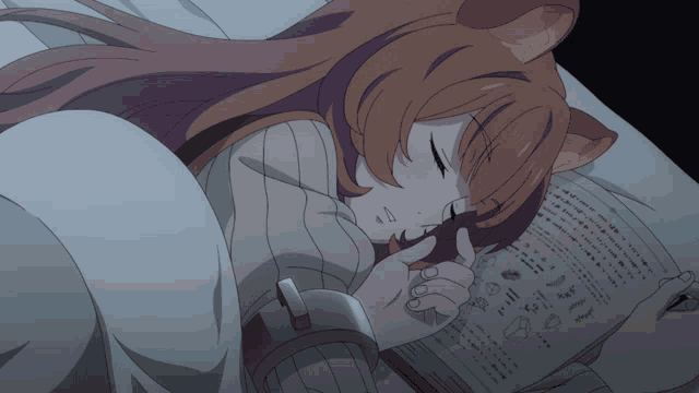 a girl with a cat ear is sleeping in a bed with a book