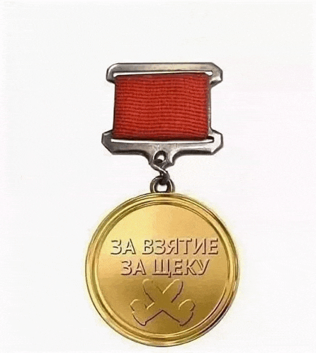 a gold medal with a red ribbon and a drawing of a heart on it .