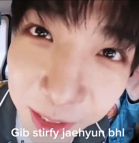 a close up of a person 's face with the words gib stirfy jaehyun bhl below it