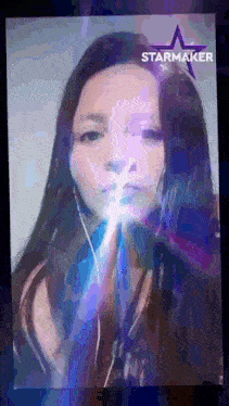 a picture of a woman with a starmaker logo on the bottom right