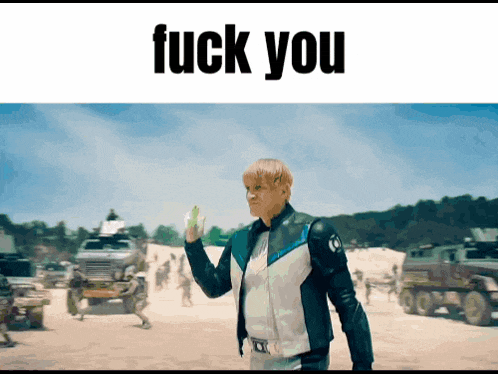 a man in a leather jacket is standing in a field with the words fuck you above him