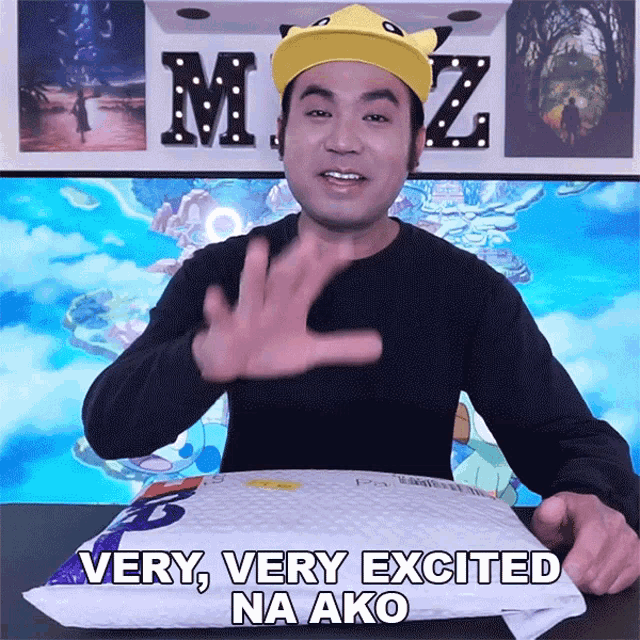 a man in a yellow hat says very excited na ako