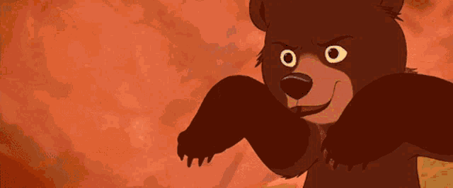 two bears are standing next to a waterfall and one is crying