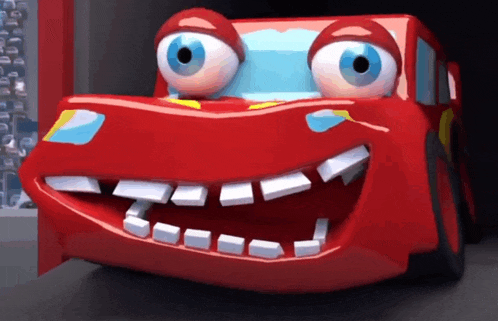 a cartoon red car with big eyes and a big mouth
