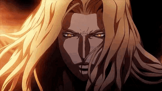a close up of a person 's face with long blonde hair and glowing eyes .