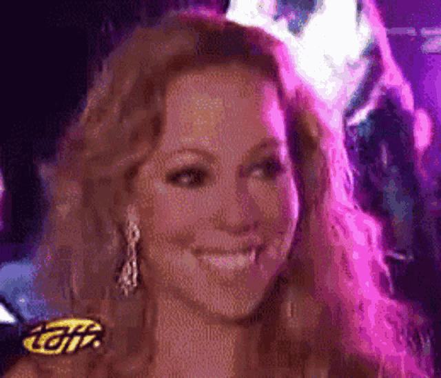 a close up of a woman 's face with a purple background and a gif logo