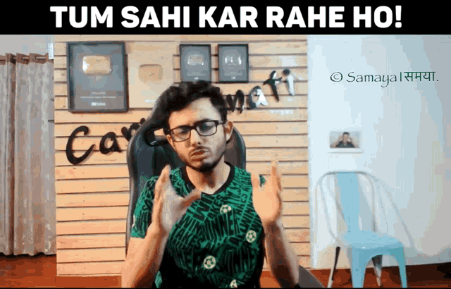 a man wearing glasses and a green shirt with the words tum sahi kar rahe ho written above him