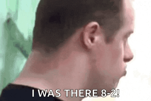a close up of a man 's neck with the words `` i was there 8 2 '' written on it .