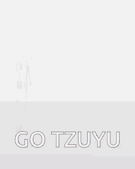 a woman in a purple dress is dancing in front of a purple wall with the words go tzuyu on it .