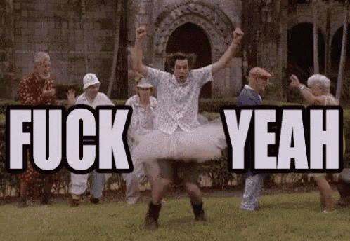 a man in a tutu is dancing in front of a group of people with the words `` fuck yeah '' written above him .
