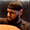 a man with a beard is wearing a headband and a hat .