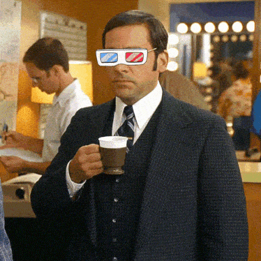 a man wearing a suit and tie is holding a cup of coffee and wearing 3d glasses