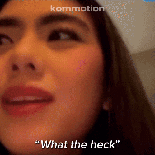 a close up of a woman 's face and the words " what the heck "