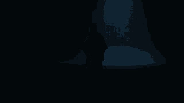 a silhouette of a person with a bandage on their head