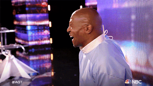a man in a surgical gown is screaming on nbc 's got talent