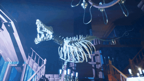 a skeleton of a dinosaur is hanging from the ceiling