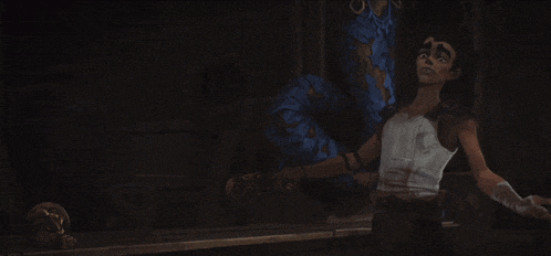 a man and a woman are fighting a monster in a dark room .