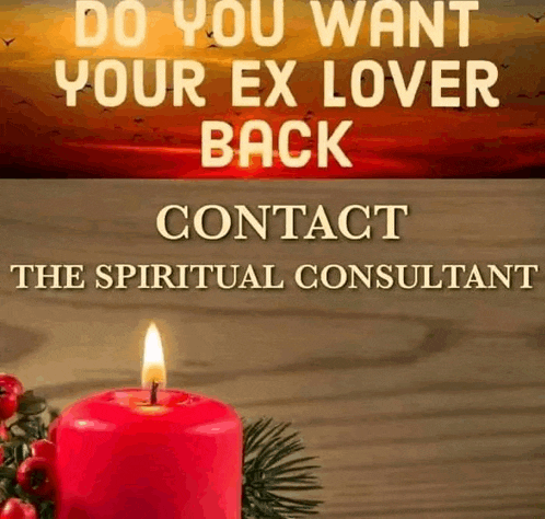 a red candle is sitting on a wooden table next to a christmas tree branch .