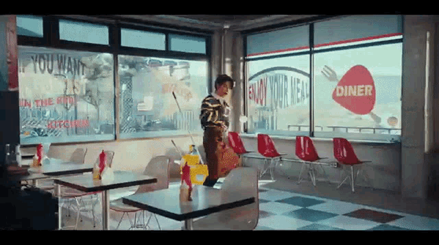 a diner with a sign that says enjoy your meal on it