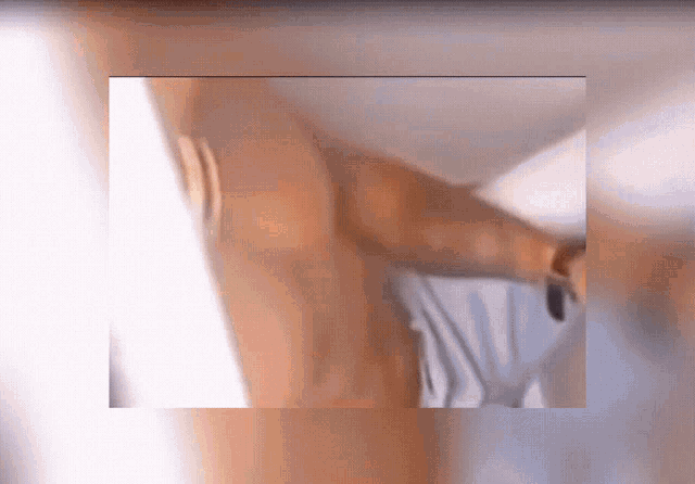 a close up of a person 's arm with a blurred background