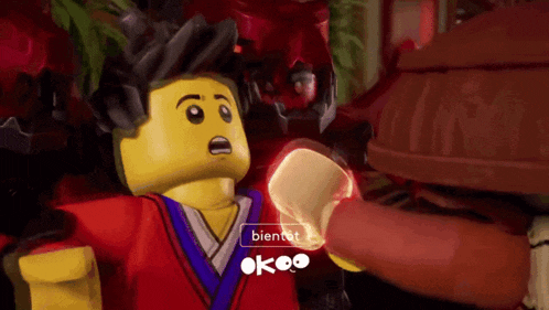 a lego character with the word bientot written on it