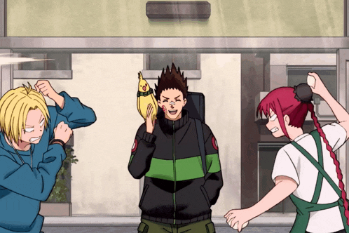 a man with a banana on his head is surrounded by two other people