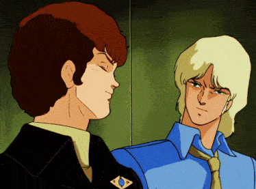 a man in a blue shirt has a badge on his shoulder that says ' a ' on it