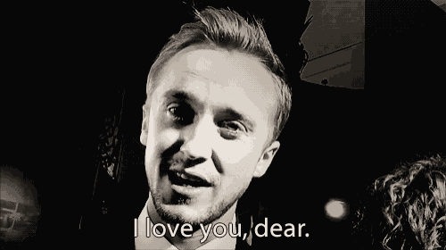 a man with a beard says i love you dear in a black and white photo