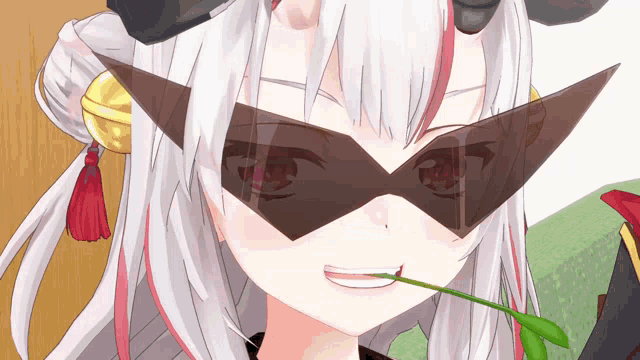 a close up of a girl wearing sunglasses and a flower in her mouth