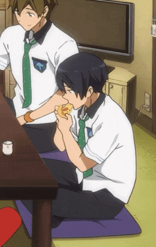 two anime characters are sitting at a table and one is eating