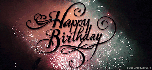 a fireworks display with the words happy birthday in the foreground