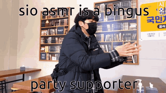 a man wearing a mask with the words sio asmr is a bingus party supporter behind him