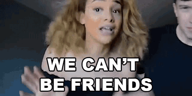 a woman is talking to a man with the words `` we can 't be friends '' .