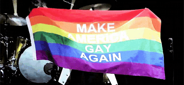 a rainbow flag that says " make america gay again "