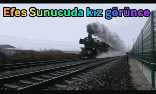 a train is going down the tracks with the words efes sunucuda kiz gorunca