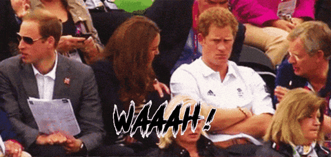 a group of people sitting in a stadium with waaah written on the bottom of the image