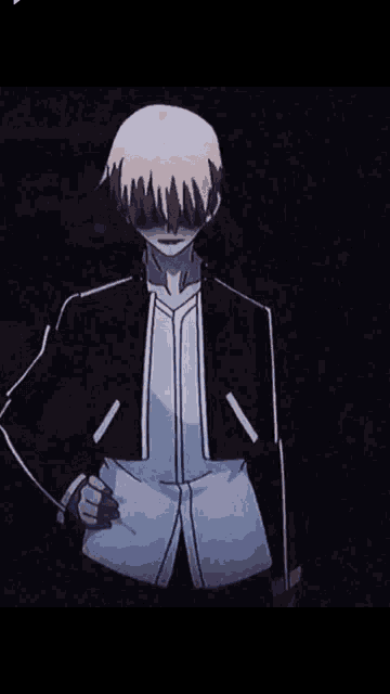 a man in a black jacket and white shirt is standing in the dark