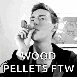 a man is smoking a cigarette in front of a picture of a frog and the words `` wood pellets ftw '' .