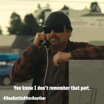 a man wearing sunglasses and a beanie talking on a phone with the caption " you know i don t remember that part