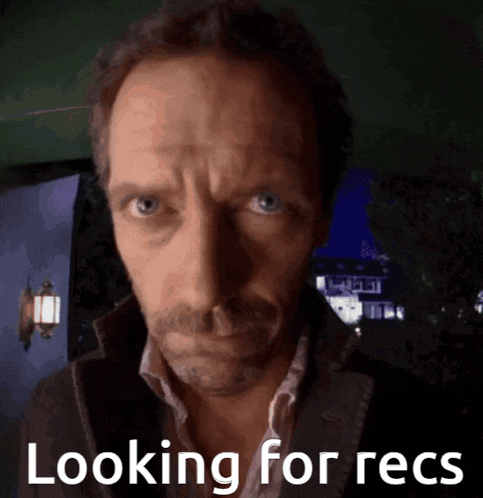 a man is looking at the camera with the words looking for recs above him