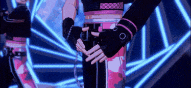 a close up of a person 's hands holding each other in a video game .