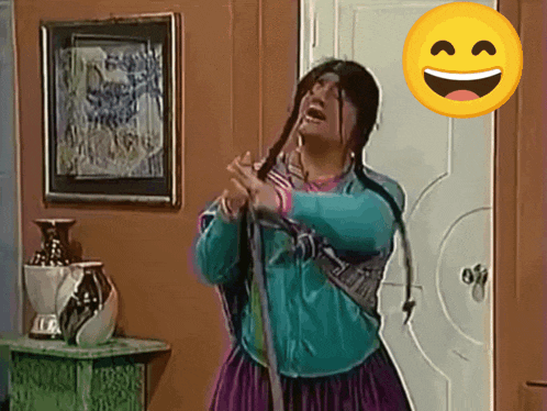 a yellow smiley face is behind a woman holding a rope