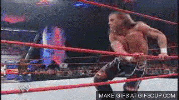 a man in a wrestling ring with a make gifs at gifsoup.com watermark