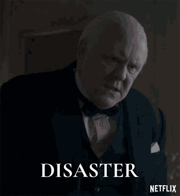 a man in a tuxedo with the word disaster written below him