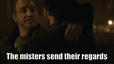 a group of people sitting in a dark room with the words " the misters send their regards " written on the bottom
