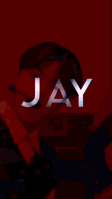 a blurred image of a person holding a white object