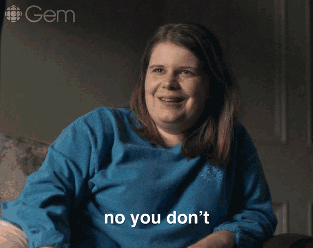 a woman sitting on a couch with the words no you don 't above her
