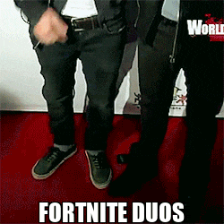 two men standing next to each other on a red carpet with the words fortnite duos written on the bottom