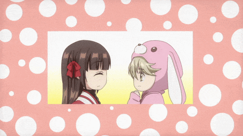 a girl in a bunny costume talks to another girl